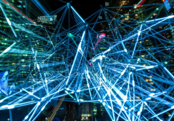 Dynamic urban scene showcasing interconnected light trails representing digital communication networks.
